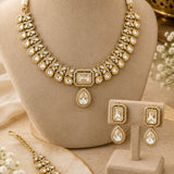 Gold Uncut Kundan & Pear-Drop Necklace Set with Maang Tikka