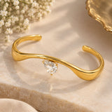 Gold Wave Teardrop Solitaire Open Cuff