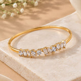 Gold Multi-Cut Scattered Crystal Tennis Bangle