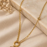Gold Dual-Chain Ring & Heart Charm Necklace