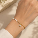 Gold Asymmetric Tennis Chain & Princess-Cut Solitaire Bracelet