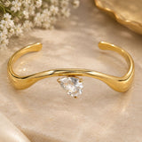 Gold Wave Teardrop Solitaire Open Cuff